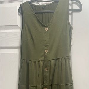 Small sleeveless green button down dress
